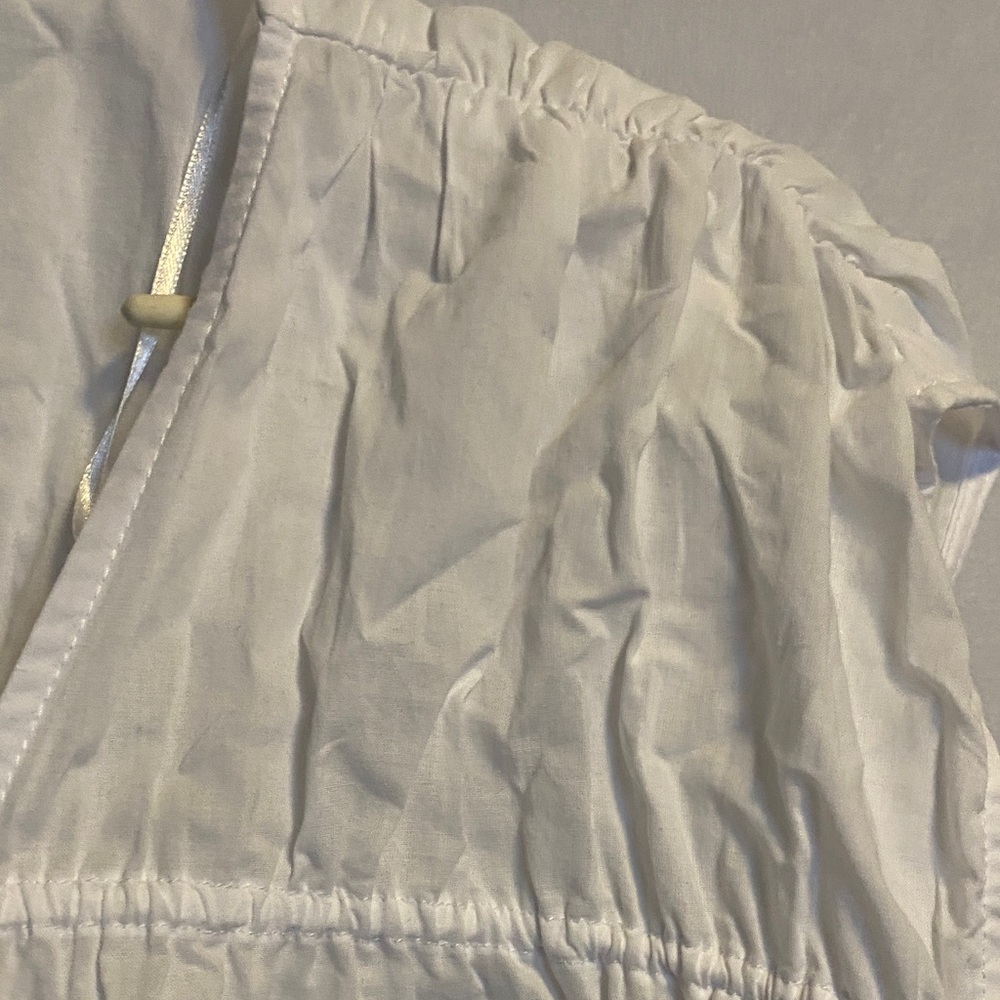 Divided White Sleeveless Top with Tie Detail - Picture 3 of 7